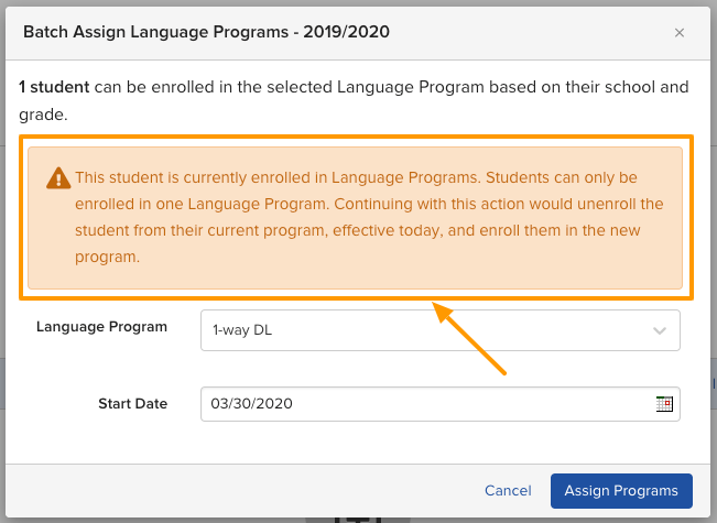 Screenshot of the Assign Language Programs dialog showing the warning message that appears when a student is already enrolled in a Language Program.
